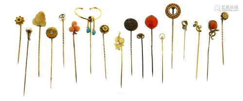Eighteen assorted gold stickpins, three set with diamonds, three with coral, three with pearls,
