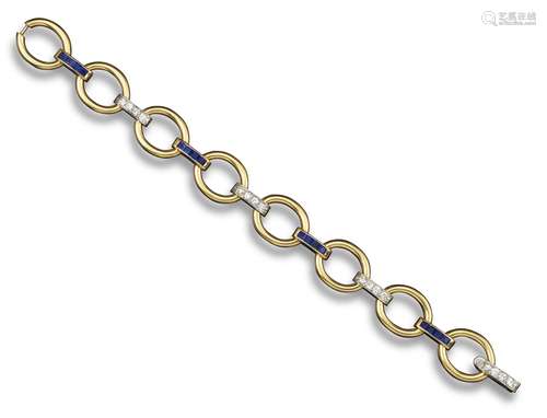 A diamond, sapphire and yellow gold bracelet, the oval-shaped gold links alternately joined with