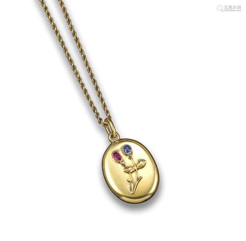 An early 20th century Russian gem-set gold oval locket pendant, applied with two flowers set with