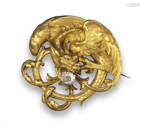 An Art Nouveau gold dragon brooch by Hartz et Cie, the realistically formed dragon with an old