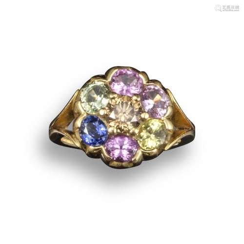 A coloured-stone cluster ring, centred with a round brilliant-cut cinnamon-coloured diamond and