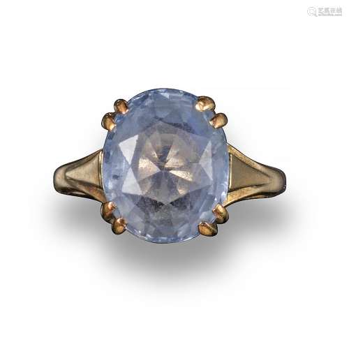 A sapphire solitaire ring, the oval-shaped sapphire set in yellow gold, size M