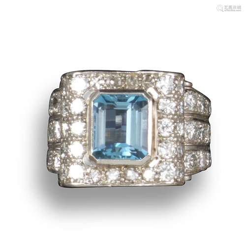 An aquamarine and diamond dress ring, c1940, the emerald-cut aquamarine is set within rectangular