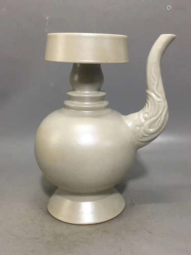 A WHITE GLAZED BIBA POT