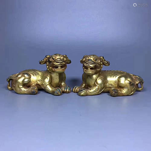 A PAIR OF OLD TIBETAN GILT BRONZE ORNAMENTS