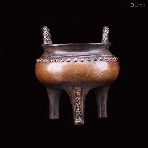 A BRONZE DOUBLE-EAR THREE FEET CENSER