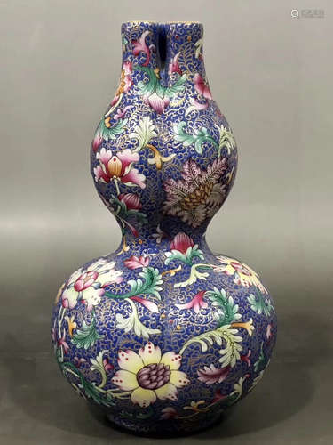 A FLOWER PATTERN BLUE GLAZED GOURD DESIGN BOTTLE