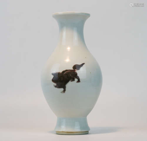 A WHITE GLAZED RED LION PATTERN VASE