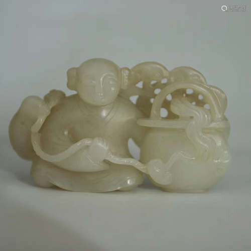 A HETIAN JADE CARVED BOY SHAPED PENDANT