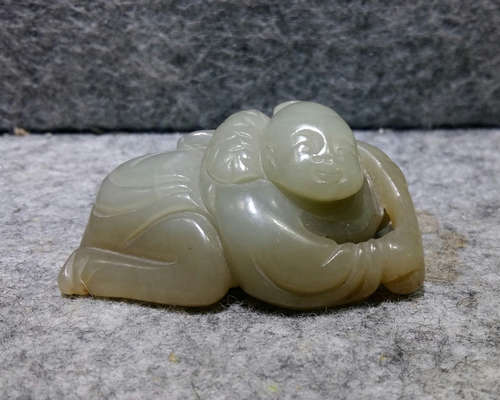 A JADE BOY FIGURE PENDANT