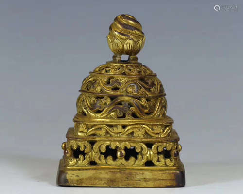 A GILT BRONZE MOLDED TIBET SEAL