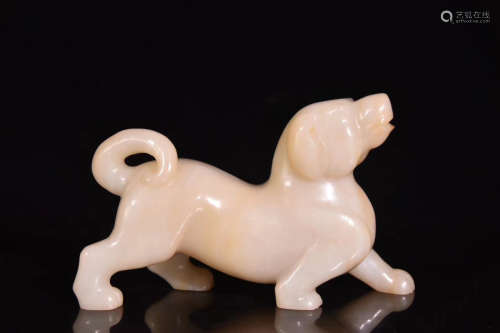 A HETIAN JADE CARVED DOG SHAPED ORNAMENT