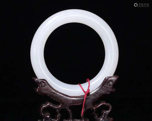 A OLD HETIAN JADE CARVED BANGLE