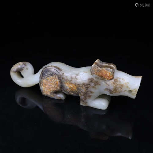A HETIAN JADE CARVED TIGER SHAPED PENDANT