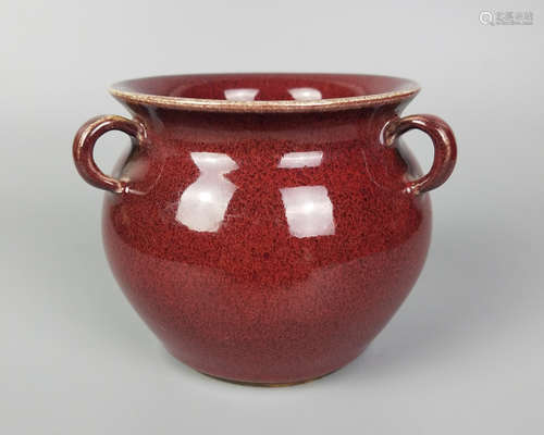 A RED GLAZED TRI-EARS CENSER