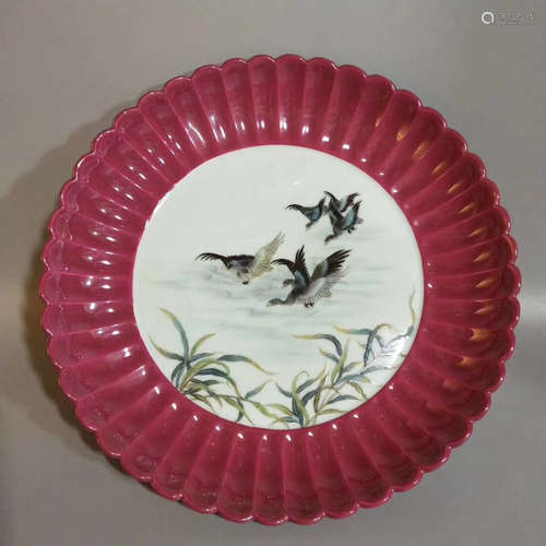 A CARMINE RED GLAZE PETAL SHAPED PLATE