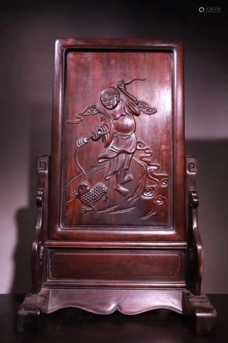 A WOOD CARVED SCREEN