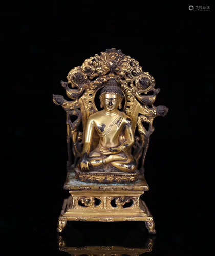 A GILT-BRONZE BUDDHA FIGURE