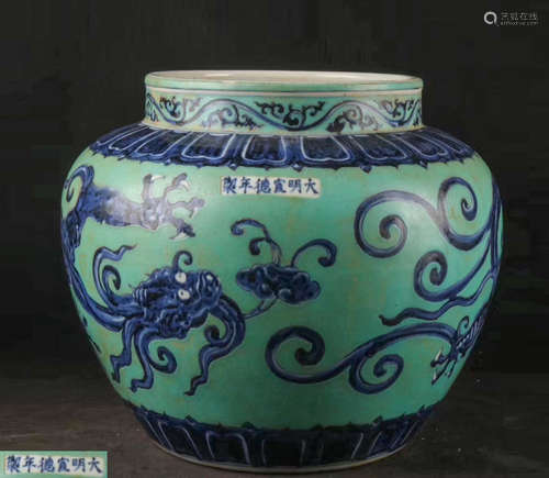 A GREEN AND BLUE DRAGON PATTERN JAR