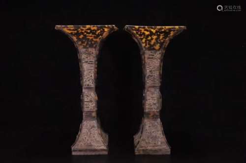 A Pair of Hawksbill Pattern Vases