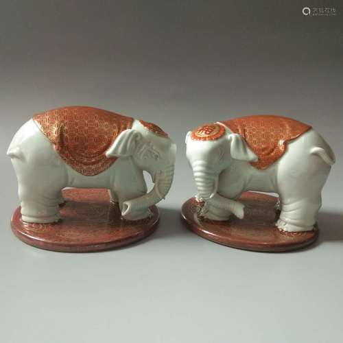 Qianlong Mark, A Pair of Gilt Celadon Glazed Elephants