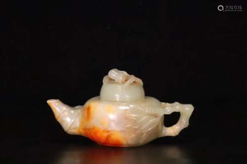 A Carved Hetian Jade Teapot