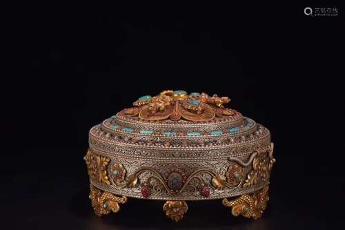 A Gilt Silver Box with Cover