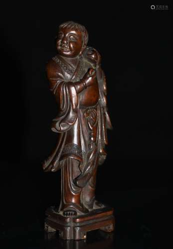 A Carved Huangyang Wood Figure