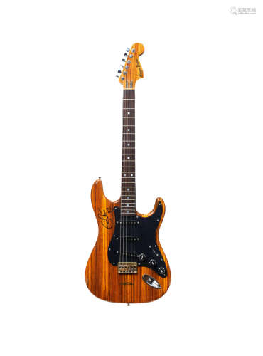 1976/77, Eric Clapton: An autographed 'Eric Clapton Zebrawood One' guitar,