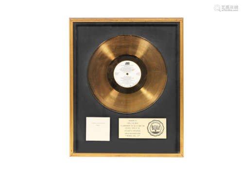 circa 1977, Emerson, Lake & Palmer: A 'Gold' award for the album Works Volume 2,