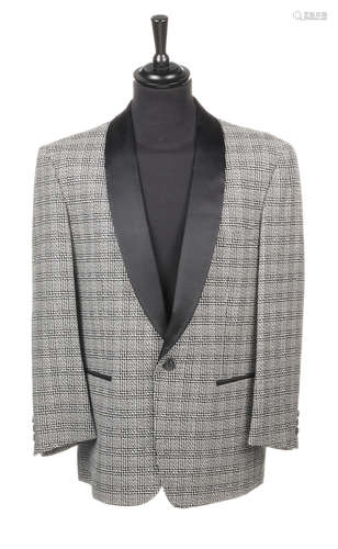 2 Elton John: A vintage black and white herringbone blazer,