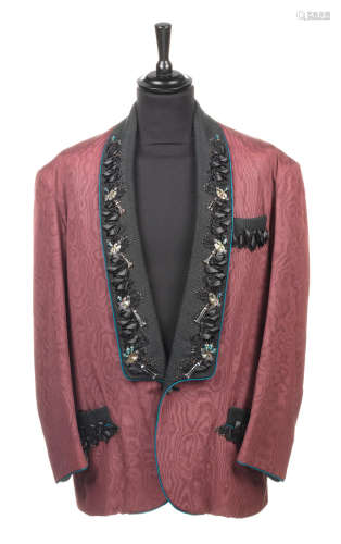 Elton John: A vintage embellished maroon blazer,