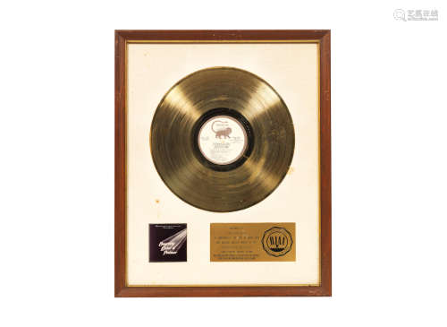 circa 1974, Emerson, Lake & Palmer: A 'Gold' award for the album Welcome Back, My Friends, To The Show That Never Ends-Ladies And Gentlemen Emerson, Lake & Palmer,