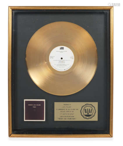 circa 1977, Emerson, Lake & Palmer: A 'Gold' award for the album Works Volume 1,