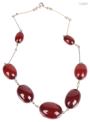 An Art Deco Cherry amber bead necklace