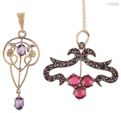 A small Art Nouveau amethyst set scroll pendant(2)