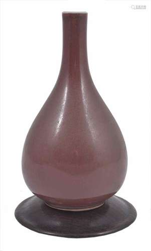 A small late 19th c. Chinese sang-de-beouf bottle vase