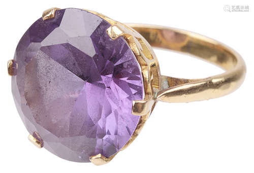 A large Continental synthetic alexandrite gold mounted dress ring