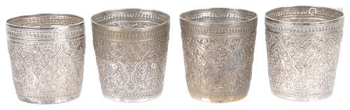 A set of four Indonesian white metal beakers, early 20th c. (4)