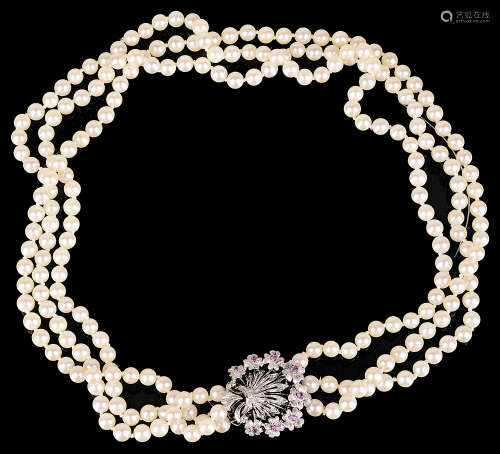 Continental cultured pearl necklace with ruby and diamond set clasp