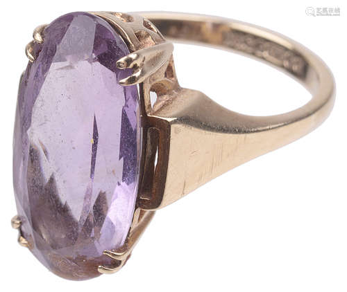 A gold mounted amethyst dress ring