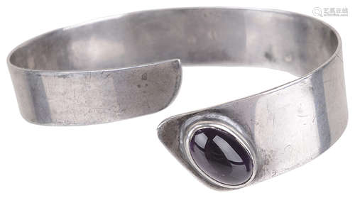 A Continental modernist silver amethyst bangle