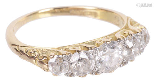 An early 20th c. attractive five stone diamond set half hoop ring