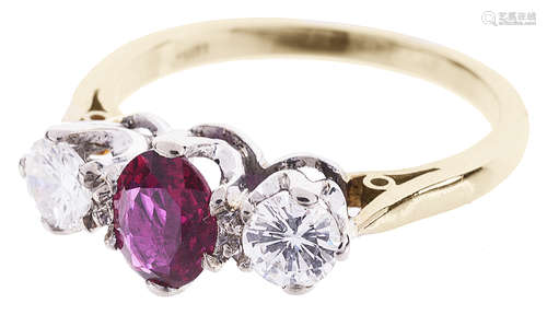 A good three stone ruby and diamond set ring