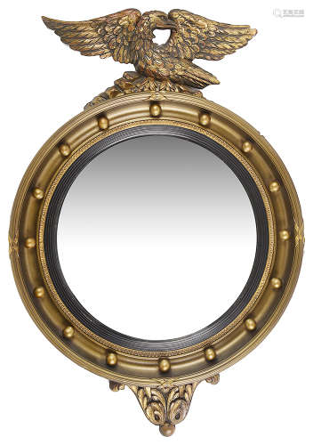 A Regency style giltwood convex circular wall mirror