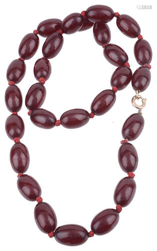 A red cherry amber bead necklace