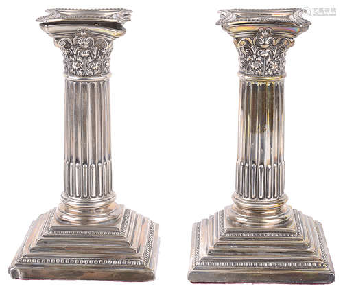 A pair of Edwardian silver dwarf candlestick, Sheffield 1909 (2)