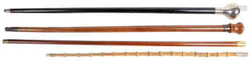 A Malacca walking cane with 15ct gold top(4)