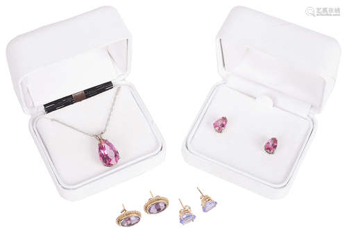 A contemporary pink topaz pendant and matching earrings