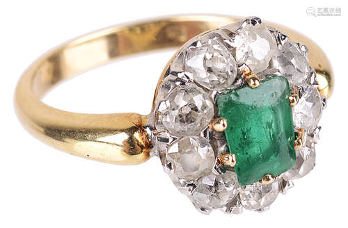 An attractive Vict. style emerald and diamond set cluster ring